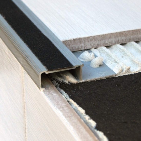 Tile-in with carbide insert