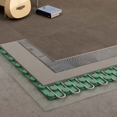 System for installation of ceramics over underfloor heating